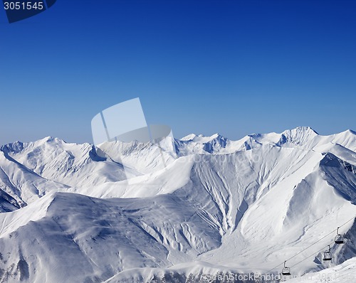 Image of Winter mountains and chair-lift at nice day