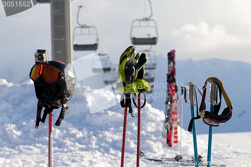 Image of Protective sports equipment on ski poles at ski resort