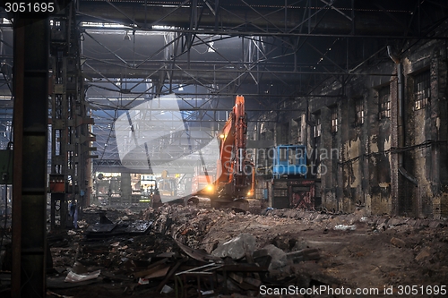 Image of Industrial interior with bulldozer inside