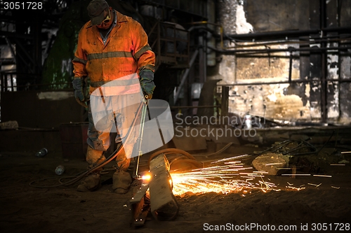 Image of Welding manwith sparks