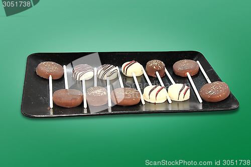 Image of Chocolate candies on a stick