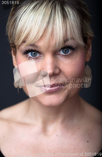 Image of Studio portrait of a cute blond girl