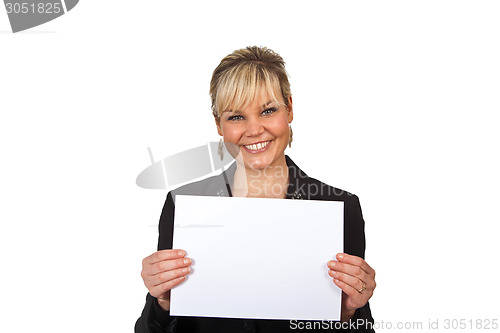 Image of Studio portrait of a cute blond girl holding a piece of paper