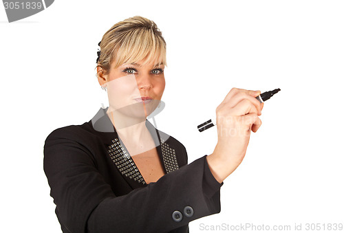 Image of Studio portrait of a cute blond girl writing on a transparent wa