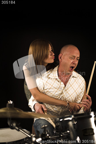 Image of bugging drummer