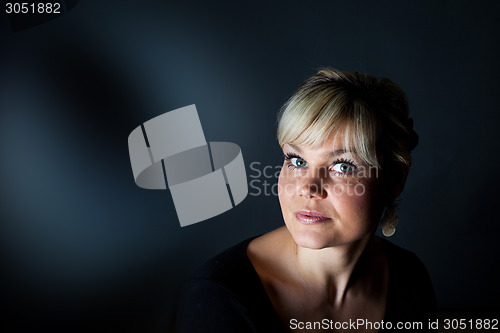 Image of Studio portrait of a cute blond girl