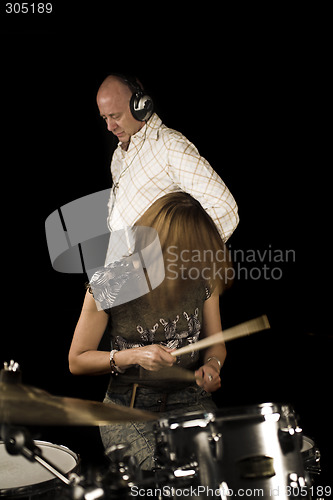 Image of woman drummer playing