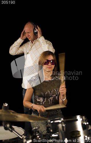 Image of woman drummer playing