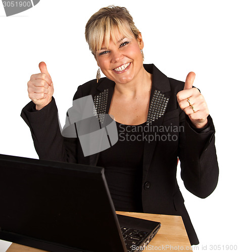 Image of Studio portrait of a cute blond girl with a computer hands up
