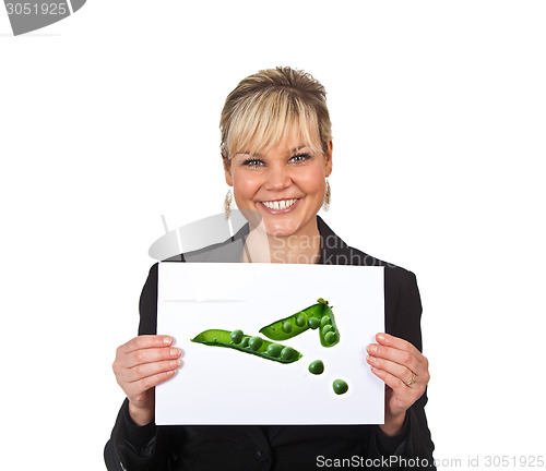 Image of Studio portrait of a cute blond girl holding a piece of paper
