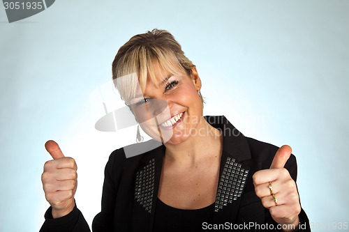 Image of Happy girl with thumbs up