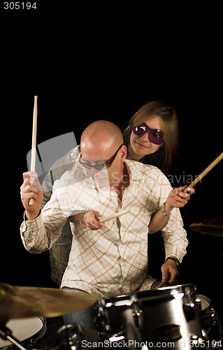 Image of couple and drums