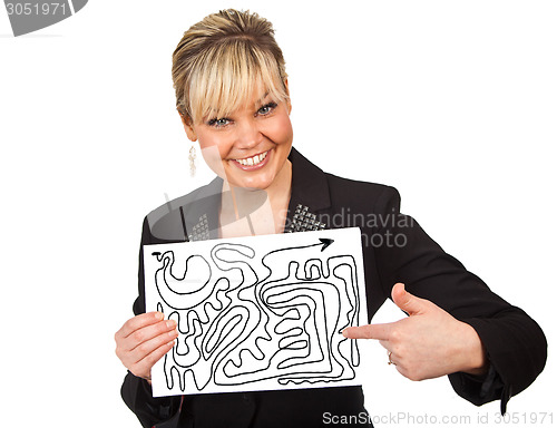 Image of Studio portrait of a cute blond girl holding a piece of paper