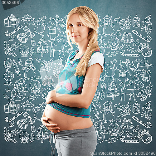 Image of Pregnant Woman Looking For Christmas Gifts