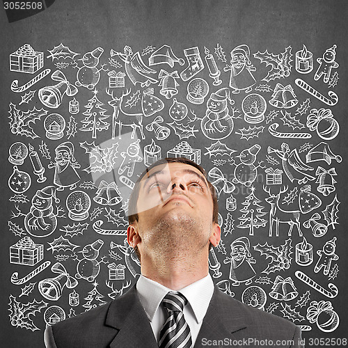 Image of Man Looking For Christmas Gifts
