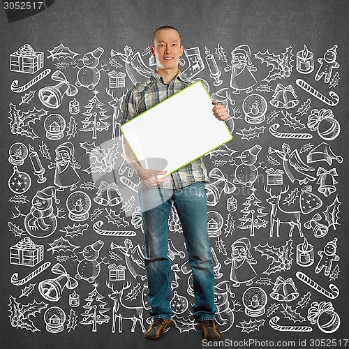 Image of Man Looking For Christmas Gifts