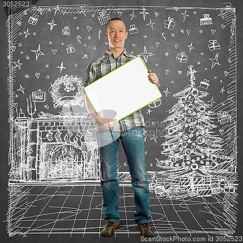 Image of Man Looking For Christmas Gifts