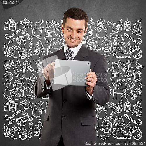 Image of Man Looking For Christmas Gifts