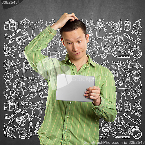 Image of Man Looking For Christmas Gifts