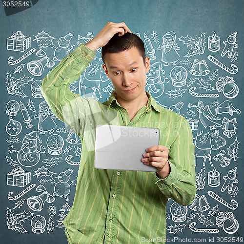 Image of Man Looking For Christmas Gifts