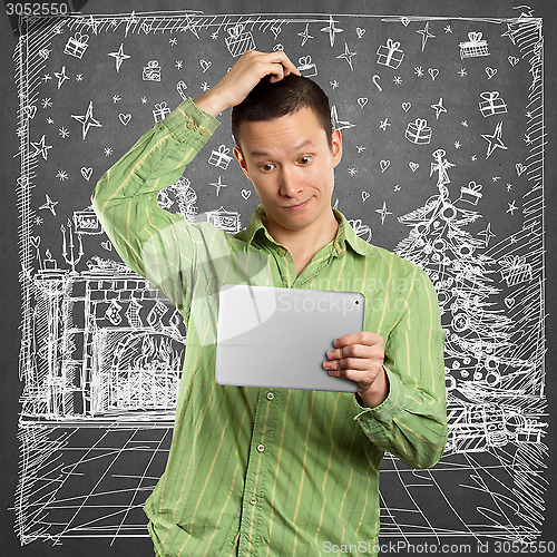 Image of Man Looking For Christmas Gifts