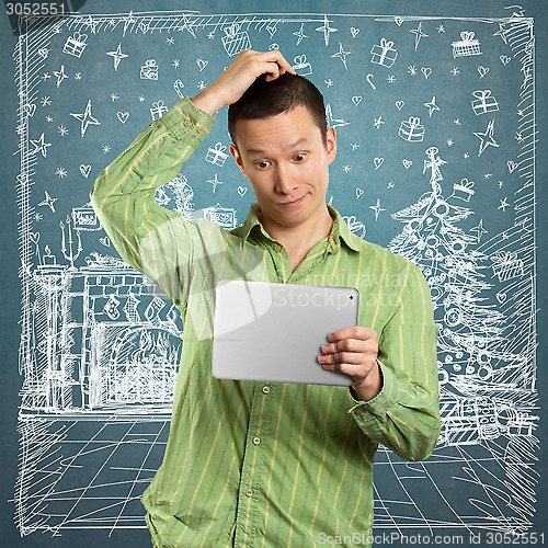 Image of Man Looking For Christmas Gifts