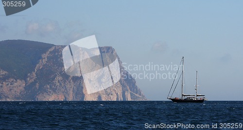 Image of Sailing ship and rocks