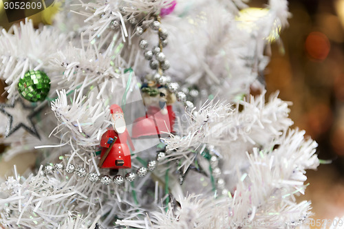 Image of Santa Claus in white tree