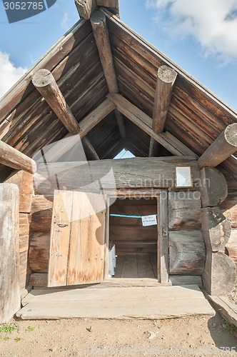 Image of Russian sauna from big logs. Front view