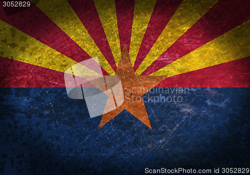 Image of Old rusty metal sign with a flag