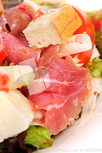 Image of Fresh salad with prosciutto