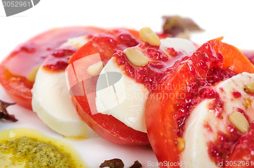 Image of Caprese antipasto salad with mozarella cheese, tomatoes 