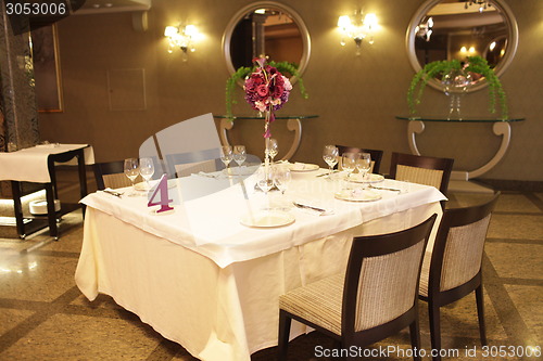 Image of Wedding served decorated tables