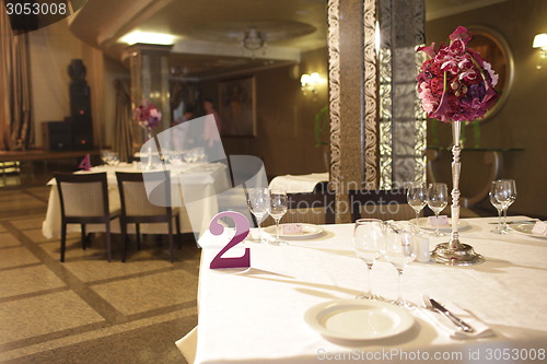 Image of Wedding served decorated tables