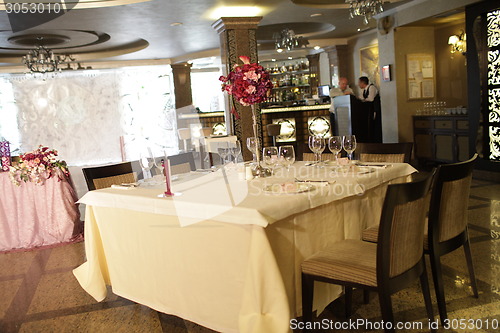 Image of Wedding served decorated tables