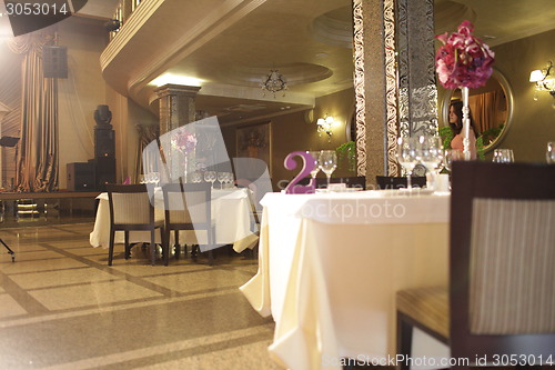 Image of Wedding served decorated tables