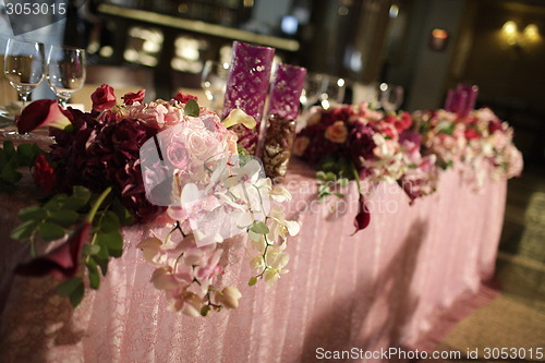 Image of Wedding served decorated tables