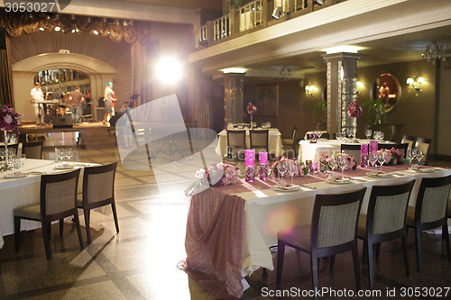 Image of Wedding served decorated tables