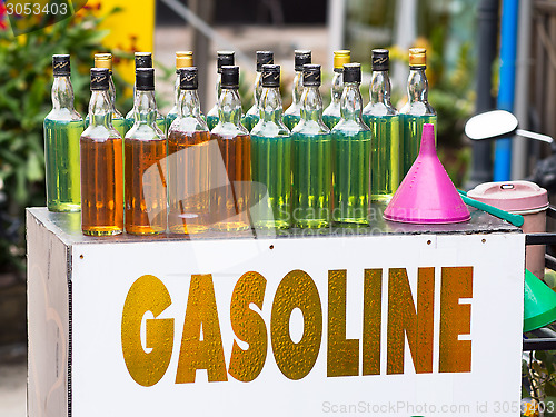 Image of Gasoline on whisky bottles in Thailand