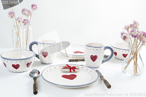 Image of breakfast table with hearts