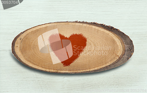 Image of wooden plate with heart