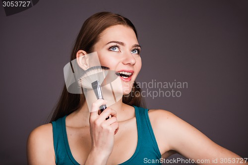 Image of Woman with brush