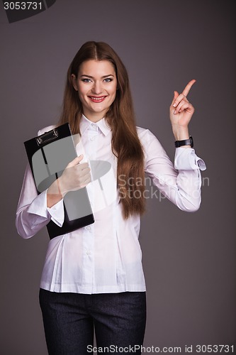 Image of Woman pointing at something