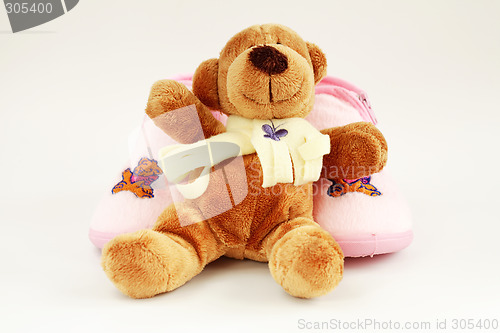 Image of Teddy and baby shoes