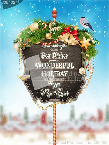 Image of Wooden banner with Christmas Fur-tree branches.