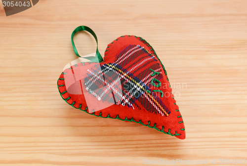Image of Handmade red plaid heart-shaped festive ornament