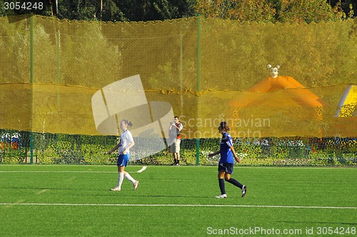 Image of Photographer shooting a football game