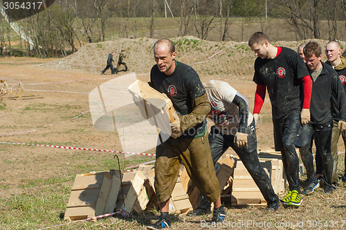 Image of carrying heavy boxes