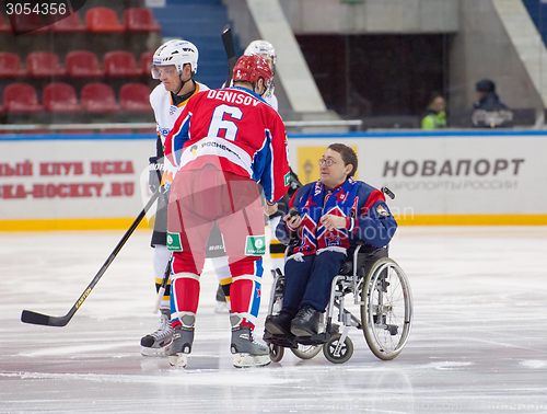 Image of Disabled fan on wheelchair