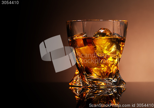 Image of Glass of golden brandy
